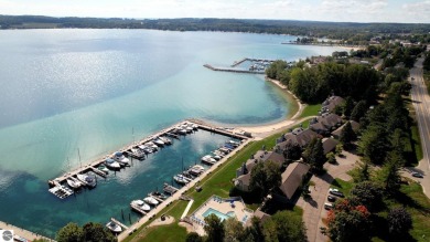 (private lake, pond, creek) Condo Sale Pending in Suttons Bay Michigan