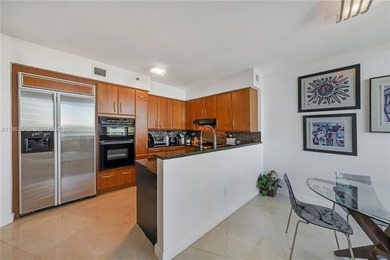 Experience refined coastal living in this impeccably maintained