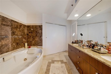 Experience refined coastal living in this impeccably maintained