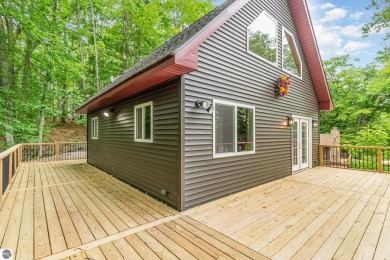 Lake Home For Sale in Glennie, Michigan