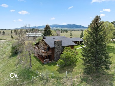 Set against 10+ acres with sweeping Montana views, this - photo 11