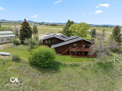 Set against 10+ acres with sweeping Montana views, this - photo 12