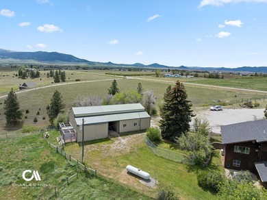 Set against 10+ acres with sweeping Montana views, this - photo 13