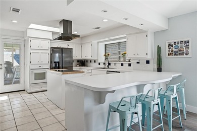 Welcome to this beautiful Key Allegro canal front home. Located - photo 14