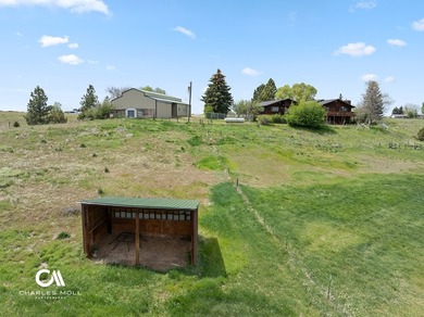 Set against 10+ acres with sweeping Montana views, this - photo 17