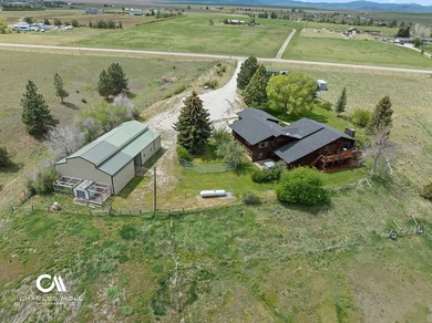 Set against 10+ acres with sweeping Montana views, this - photo 18