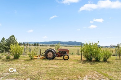 Set against 10+ acres with sweeping Montana views, this - photo 23