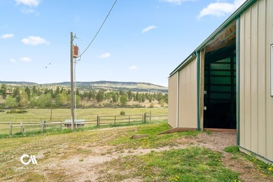 Set against 10+ acres with sweeping Montana views, this - photo 26