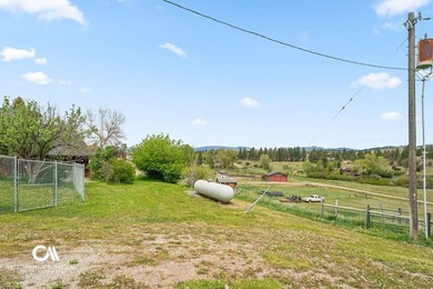 Set against 10+ acres with sweeping Montana views, this - photo 30
