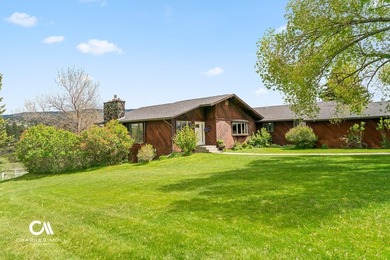 Set against 10+ acres with sweeping Montana views, this - photo 40