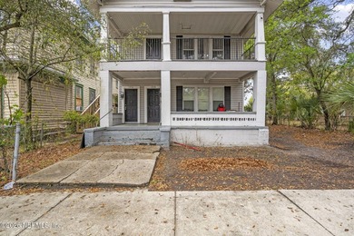 Unlock the potential of this versatile duplex located in a - photo 2