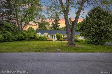 Beautifully updated 3-bedroom, 3 full bath ranch situated on a - photo 1
