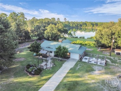 Lake Home For Sale in Ludowici, Georgia