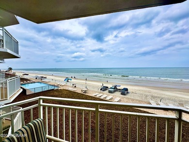 Experience breathtaking direct oceanfront living in this