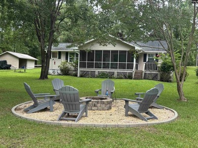 Lake time perfected in this 3 bedroom lake cabin! Large - photo 1