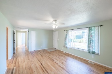 This property hosts both a main home & a studio with alley