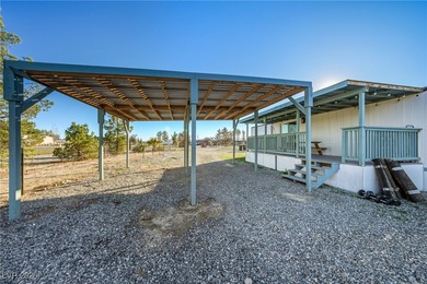 Affordable living just outside of Las Vegas! This 2 bedroom, 1