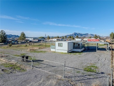 Affordable living just outside of Las Vegas! This 2 bedroom, 1