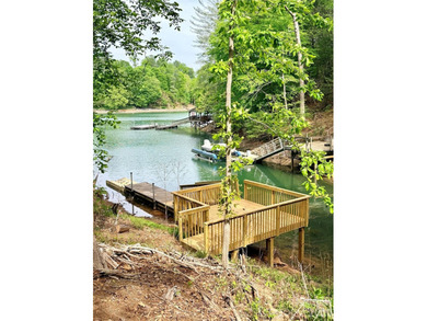 Long-range water views and a fully equipped dock setup make this - photo 35