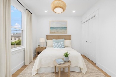 Thoughtfully renovated two-unit multi-family home with an - photo 13