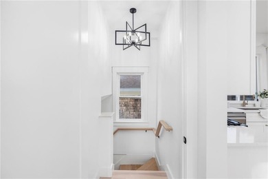 Thoughtfully renovated two-unit multi-family home with an - photo 26