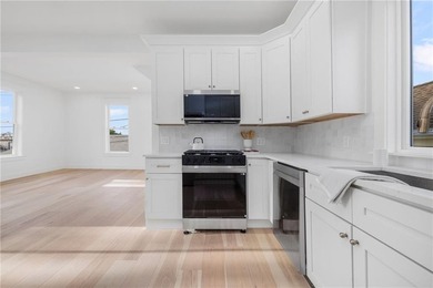 Thoughtfully renovated two-unit multi-family home with an - photo 33