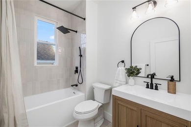 Thoughtfully renovated two-unit multi-family home with an - photo 37