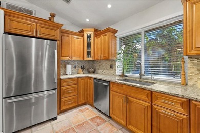 Behind the gates of Boca Pointe, this 3BR/3BA corner townhome - photo 12