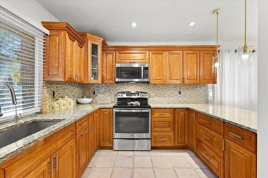 Behind the gates of Boca Pointe, this 3BR/3BA corner townhome - photo 14