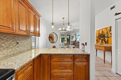 Behind the gates of Boca Pointe, this 3BR/3BA corner townhome - photo 15
