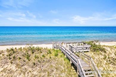 Nestled on a private wooded lot within a gated community, this - photo 4