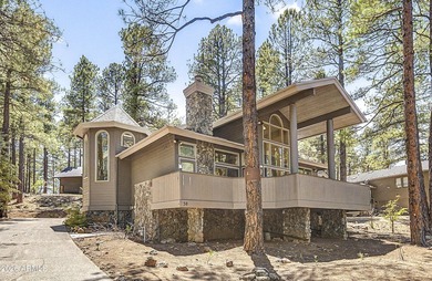Majestic home perched on a large custom lot with tons of windows - photo 1