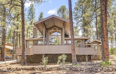 Majestic home perched on a large custom lot with tons of windows - photo 2
