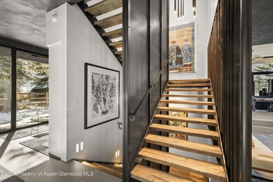 A landmark of contemporary mountain architecture, this - photo 12