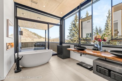 A landmark of contemporary mountain architecture, this - photo 18