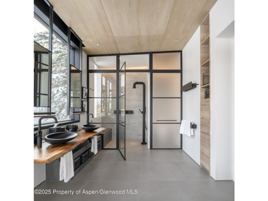 A landmark of contemporary mountain architecture, this - photo 19