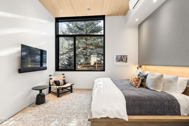 A landmark of contemporary mountain architecture, this - photo 21