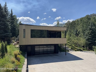 A landmark of contemporary mountain architecture, this - photo 42