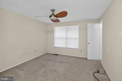 Welcome to this charming end-unit duplex featuring 3 bedrooms - photo 11