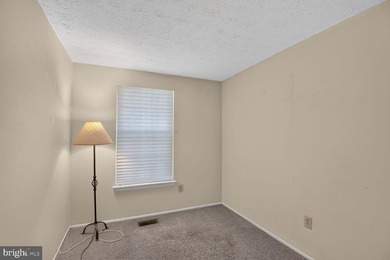 Welcome to this charming end-unit duplex featuring 3 bedrooms - photo 15