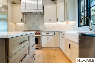 Perched within the gated enclave of Chinquapin, this stunning - photo 18