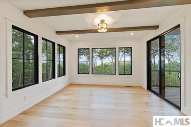 Perched within the gated enclave of Chinquapin, this stunning - photo 31