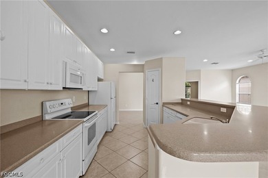 Welcome to this exceptional home in the gated Colonial Shores - photo 12