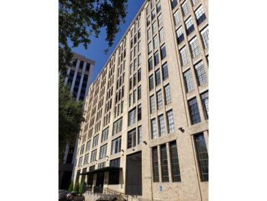 PRICED TO SELL! Welcome to Soco Urban Lofts, where historic