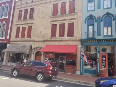 Downtown commercial building with lots of potential. Let your - photo 1