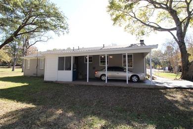This charming home is a 3 bedroom, 2 bath, 1 car carport has
