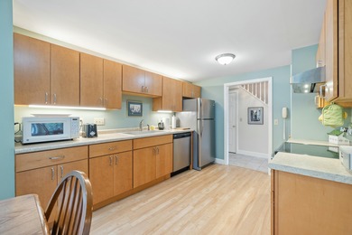 Experience the tranquility of an end-unit condominium, where - photo 13