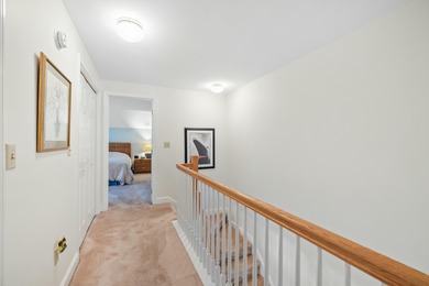 Experience the tranquility of an end-unit condominium, where - photo 29
