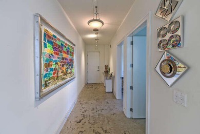 The main level offers a newer custom kitchen with marble - photo 3