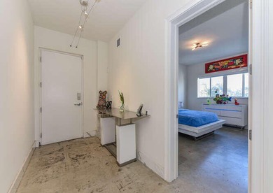 The main level offers a newer custom kitchen with marble - photo 4